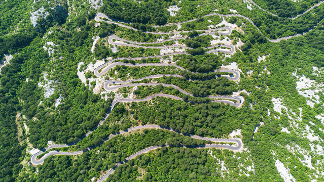 Aerial view on the Kotor Serpentine, a steep hairpin road with 16 turns between Kotor and Cetinje passing through the Lovcen National Park in Montenegro