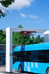 A Modern Electric Bus Station that features EcoFriendly and Sustainable Transport Solutions