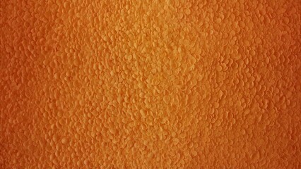 Orange textured surface with layered petal-like pattern.