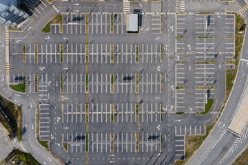 Top-down aerial view of empty car parking lots.