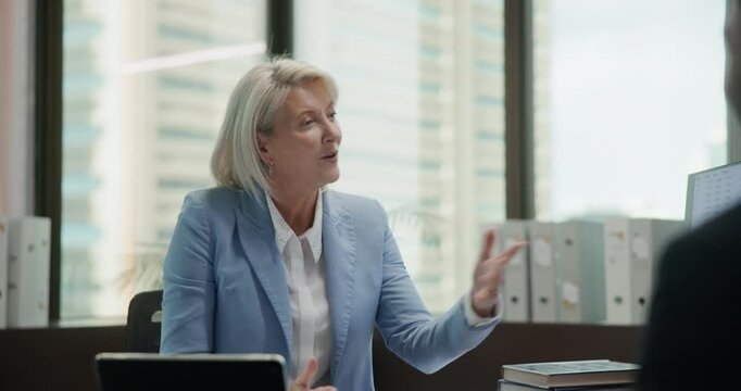 Business, mature woman and man with handshake in office for welcome, interview or job opportunity. Meeting, hiring and HR with candidate shaking hands for greeting, introduction or recruitment