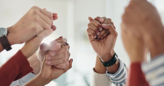 Business people, closeup and holding hands in office for teamwork, prayer together and support. Employees, spiritual group and touch zoom for team building with faith, staff diversity and connection