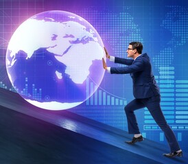 Businessman pushing earth in business concept