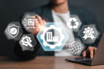A professional interacting with a digital interface showcasing various facility management icons,...
