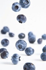 Falling Blueberry isolated on white background, full depth of field