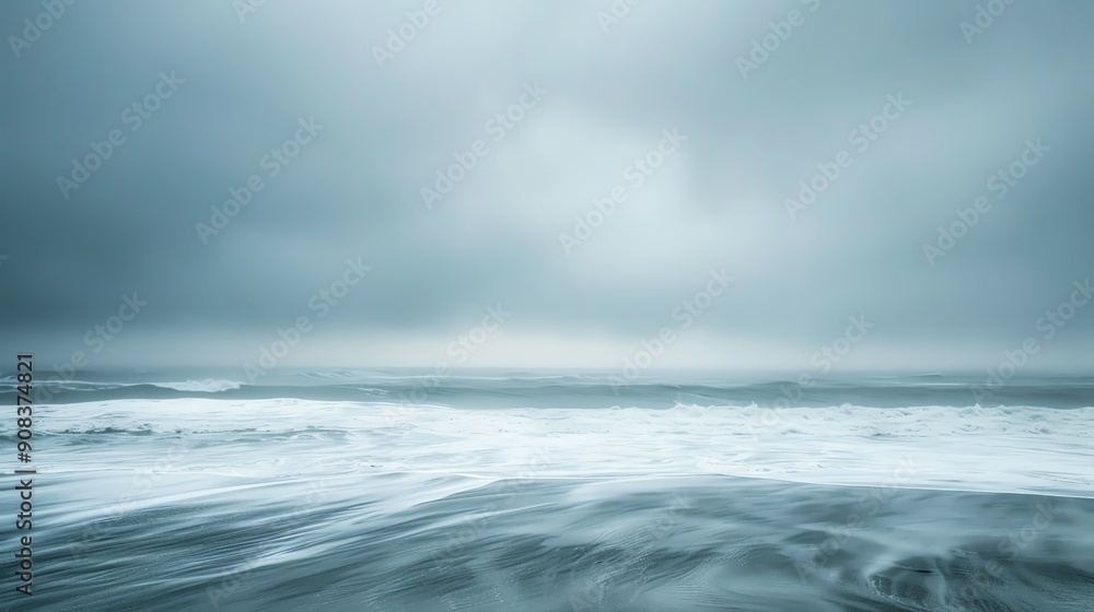 Wall mural A moody seascape with cloudy sky and foamy waves.