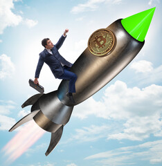 Businessman flying on rocket in bitcoin price rising concept