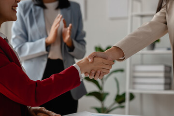 two big companies handshake because they agree on a business deal, businesspeople just signed...