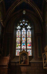 Fototapeta premium One of stained glass windows of the Saints Peter and Paul Basilica in the Vysehrad district of the Prague in the Czech Republic