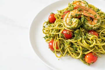 Spaghetti with prawns or shrimps in homemade pesto sauce