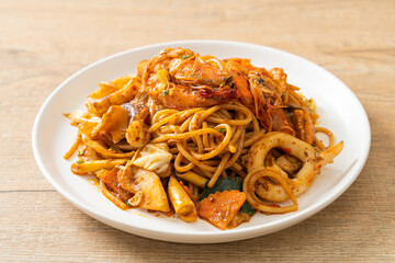 stir fried Tom Yum seafood dried spaghetti