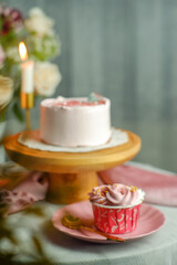 The cake and cup cakes served at a party table. Cake  stilllife photography