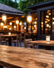 photo wooden table and blurred background of outdoor restaurant with bokeh light. High quality photo 