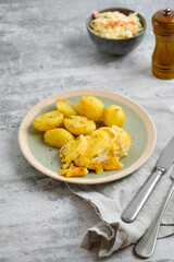 Pork chops with cheese and roasted potato