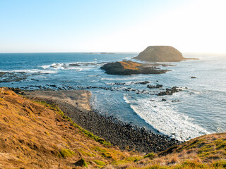 View of rocks and wave splashes at Phillip Island, Victoria, Australia