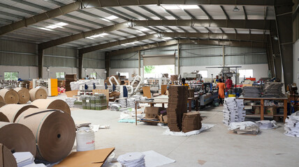 Bangalore, India 1st August 2024: Modern factory for the production of Corrugated Carton Boxes at a...