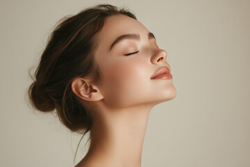 Fototapeta premium A close up of a girl's face with her eyes closed