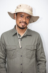 Fototapeta premium Samart executive camping man with advaenture hat on white background