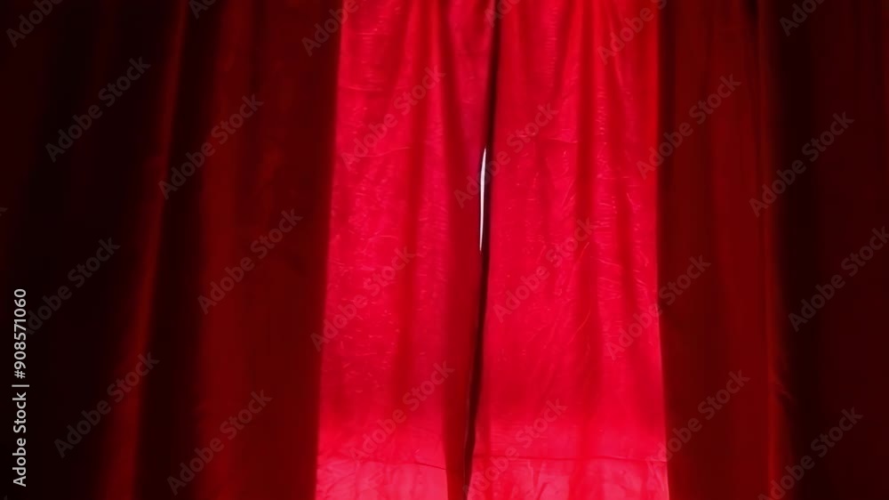 Poster a close up of red curtains with light filtering through, creating a warm, inviting atmosphere in an 