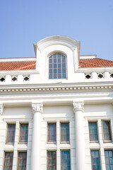 bottom view of classic old building with empty sky space for advertising.