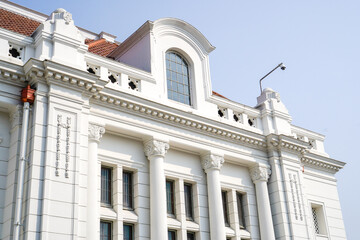 bottom view of classic old building with empty sky space for advertising.