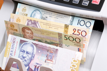 Haitian gourde in the counting machine