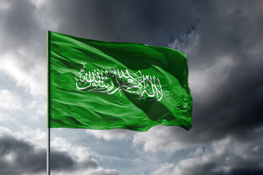 Flags of Hamas above dark sky - Powered by Adobe