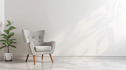 A minimalist living room featuring a comfortable armchair and a green plant in a white pot, creating a serene and modern interior design.