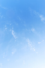 beautiful blue sky and white fluffy group of clouds with sunrise in the morning, natural background