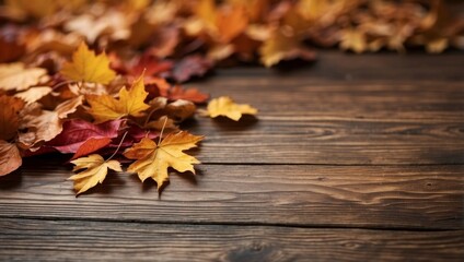 Obraz premium Autumn leaves on wooden background Top view with copy space.