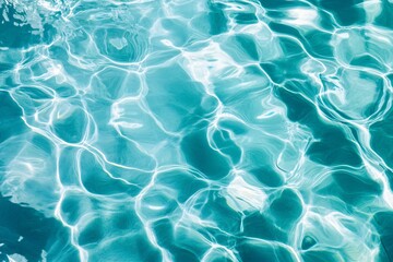 Calm turquoise water with gentle ripples and reflections, evoking a serene and refreshing atmosphere.
