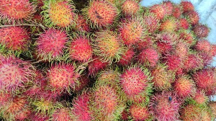 close up of red rambutan fruit