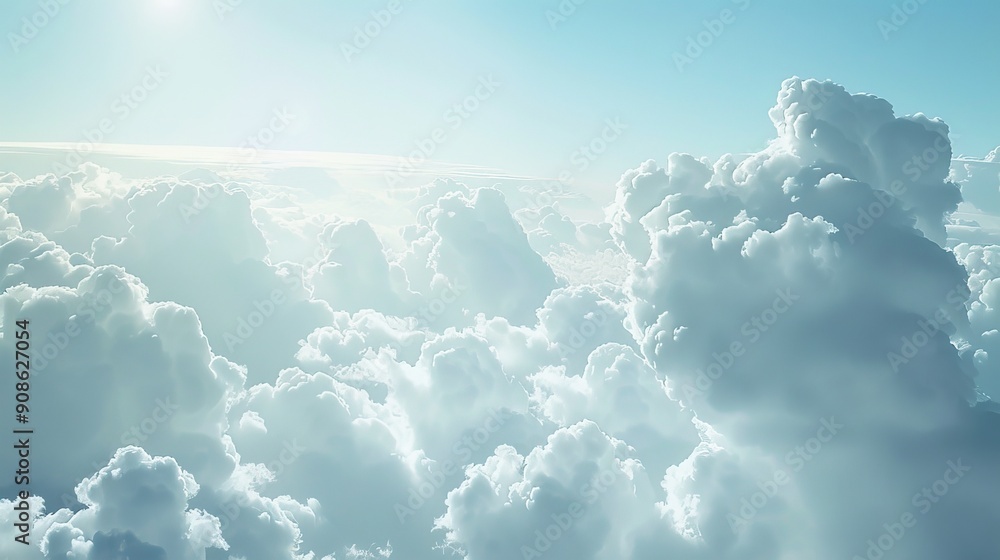 Poster Fluffy clouds gather over a serene landscape, their soft forms creating a dreamy and peaceful atmosphere.