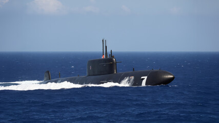 Fototapeta premium military nuclear submarine floating in the middle of the ocean while shooting an undersea torpedo missile