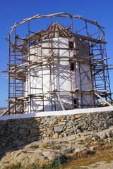 Old Mykonian Windmill covered in Scaffolding