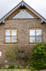 facade of a European house building with beautiful windows
