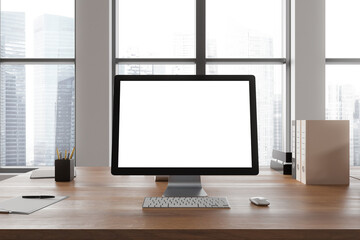 Fototapeta premium Office coworking interior with pc computer on table with mockup display, window