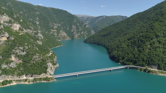 Aerial view of famous Piva Canyon with its fantastic reservoir