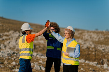 Engineers Collaborating in the Field to Inspect and Optimize Electric Turbines.