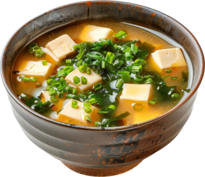 Delicious miso soup with tofu cubes and chopped green onions served in a rustic bowl, perfect for a warm and comforting meal. - Powered by Adobe