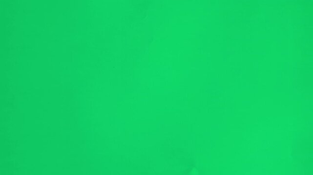 A full screen paper burst with a hole tearing from the middle in a stop motion style.