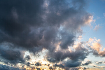 Dramatic Colorful Sunset Sky . Clouds with Sunrays. Cloudscape Nature Background. Panorama