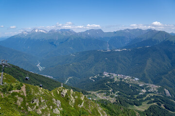 View of rocky mountains and forest on a sunny summer day