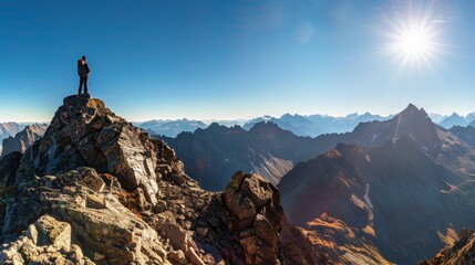Obraz premium Adventurous Outdoor Hiker on Mountain Summit