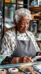 An elderly woman carefully inspects a dessert in a bakery filled with delicious treats