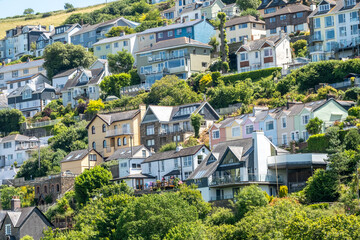 Fototapeta premium Hotels, guesthouses and B&Bs on the hillside on the side of the River Dart