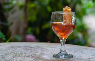 Wild honey, natural food in a glass bottle