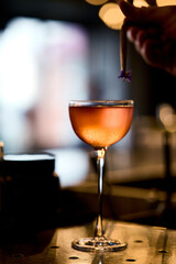 Cocktail in a fine dining restaurant, alcoholic cocktail on a bar counter