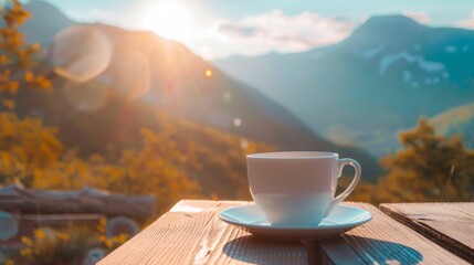 Cup of Coffee on Wooden Table with Mountain and Sunset View