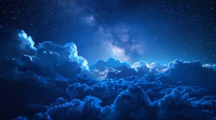 Photo of the night sky with clouds and stars.